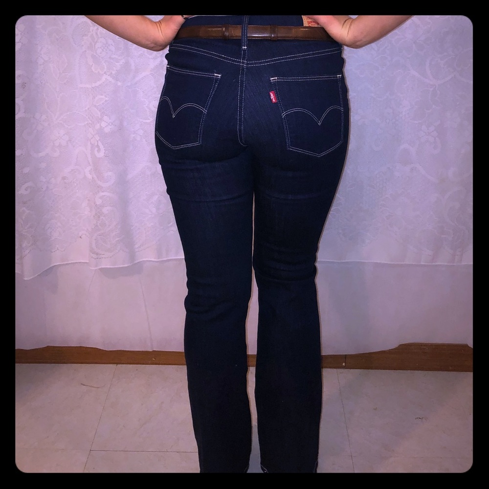 Levi’s dark denim red tag slimming boot cut jeans
